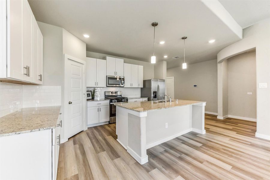 Furnished interior view inside a new home in Sundance Cove - Premier Series, Crosby (Image 8).