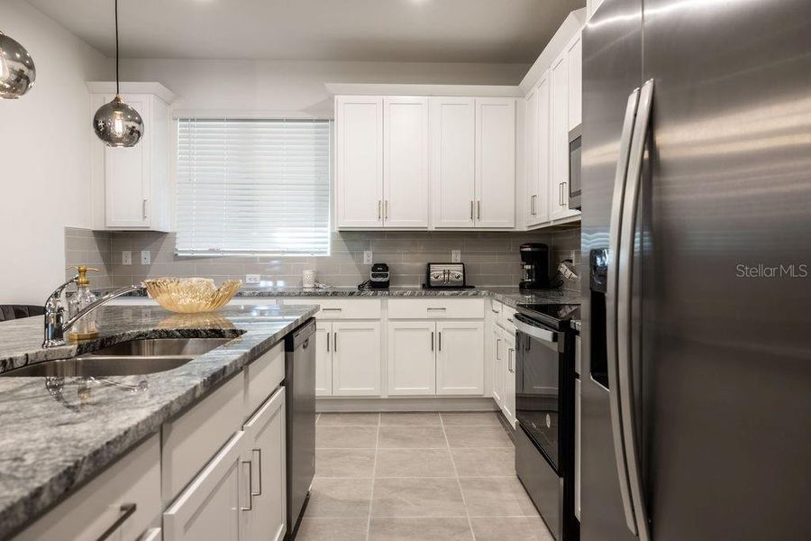 Furnished interior view inside a new home in , Kissimmee (Image 47). Furnished interior view inside a new home in , Kissimmee (Image 47).