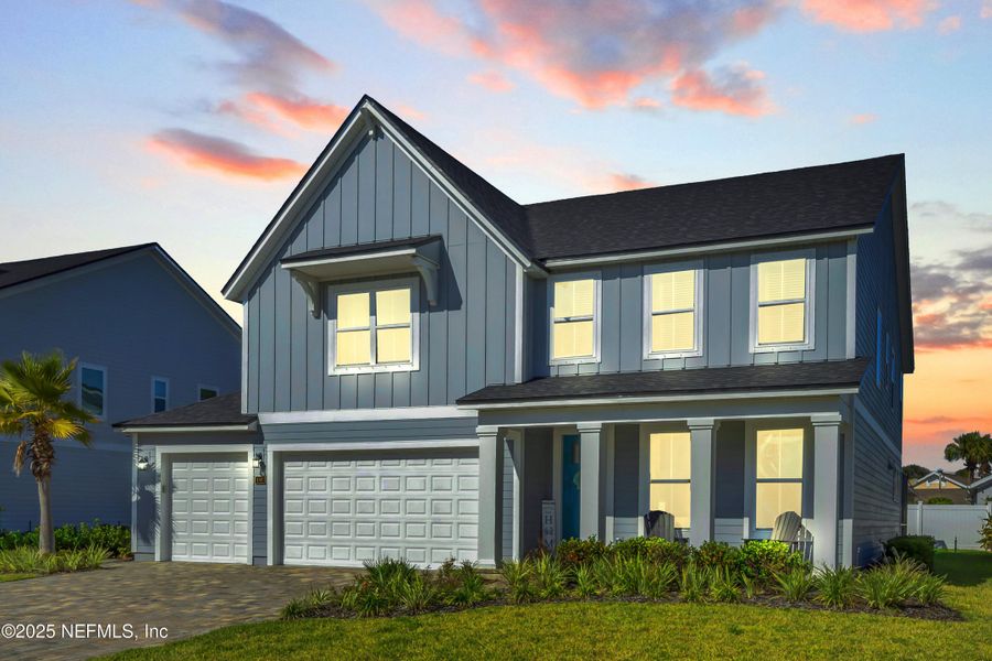 Front exterior of a new home in Seaside Vista, St. Augustine, FL, highlighting curb appeal (Image 26). Front exterior of a new home in Seaside Vista, St. Augustine, FL, highlighting curb appeal (Image 26).