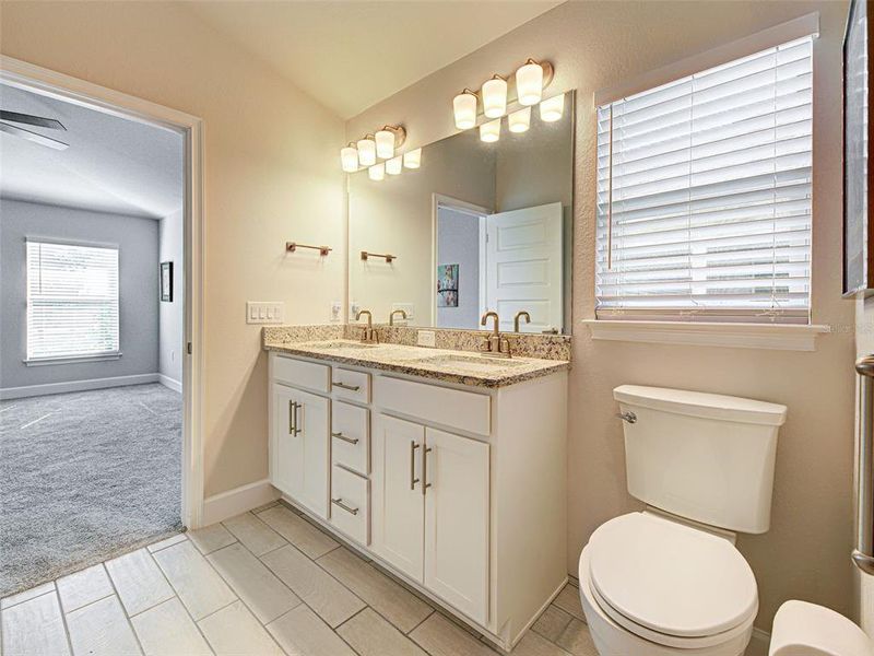 Furnished interior view inside a new home in Watercress Cove, North Port (Image 17).