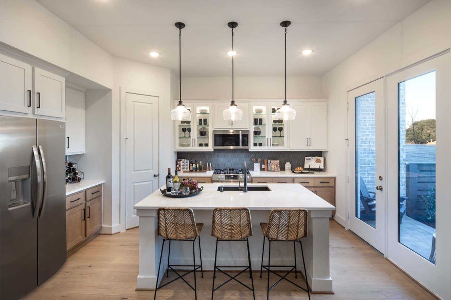 Representative furnished interior of a home built from the Chester Plan by Highland Homes in Bridgeland Central: The Cottages, Cypress (Image 5).