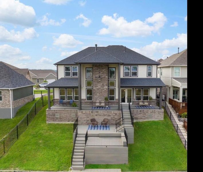Exterior details and patio area of a home in Lake Breeze, Willis (Image 2). Exterior details and patio area of a home in Lake Breeze, Willis (Image 2).