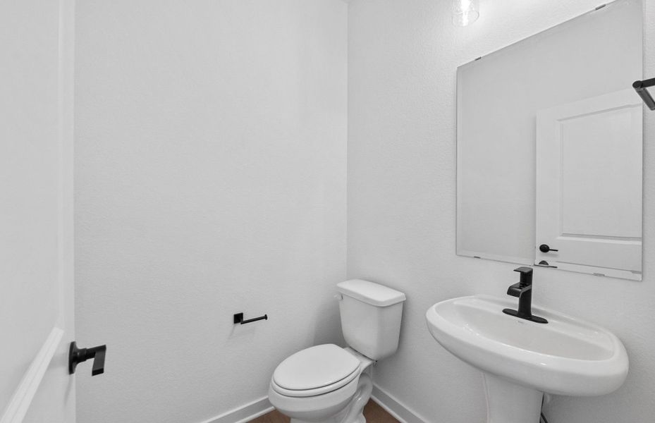 Furnished interior view inside a new home in Wolf Ranch, Georgetown (Image 13).