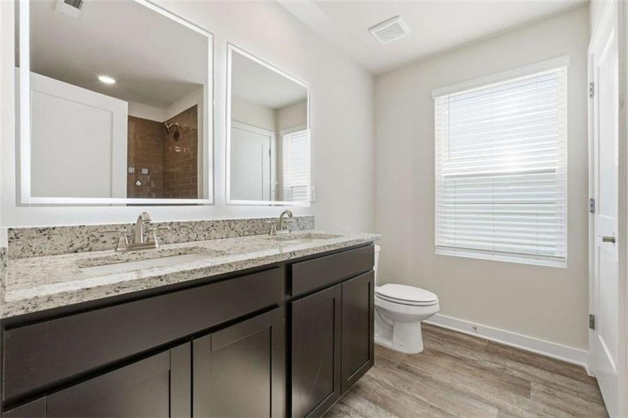Furnished interior view inside a new home in The Enclave at Stonewall Station, Union City (Image 9).