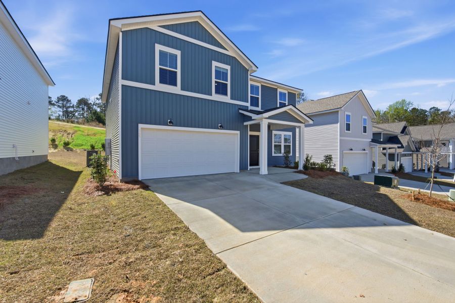 Front exterior of a new home in Grand Arbor, Blythewood, SC, highlighting curb appeal (Image 20).