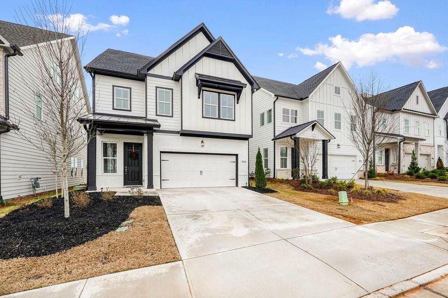 Front exterior of a new home in , Canton, GA, highlighting curb appeal (Image 24). Front exterior of a new home in , Canton, GA, highlighting curb appeal (Image 24).