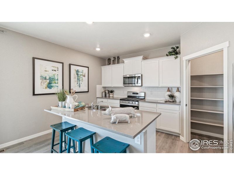 Furnished interior view inside a new home in Fossil Creek Ranch, Windsor (Image 13). Furnished interior view inside a new home in Fossil Creek Ranch, Windsor (Image 13).