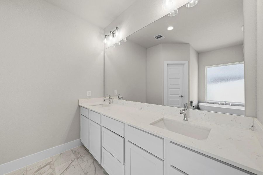 Furnished interior view inside a new home in Barton Creek Ranch, Conroe (Image 5).