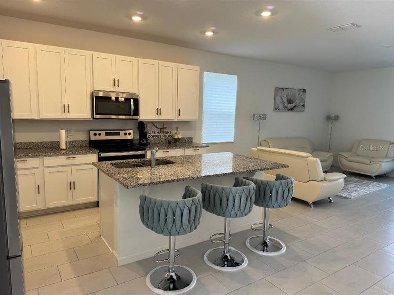 Furnished interior view inside a new home in Cypress Park Estates, Haines City (Image 18).