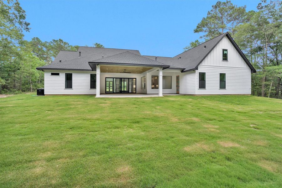 Exterior details and patio area of a home in , Plantersville (Image 4).