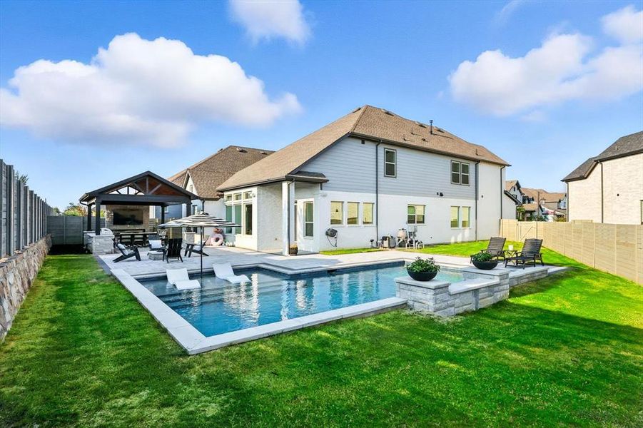 Front exterior of a new home in , Argyle, TX, highlighting curb appeal (Image 22). Front exterior of a new home in , Argyle, TX, highlighting curb appeal (Image 22).