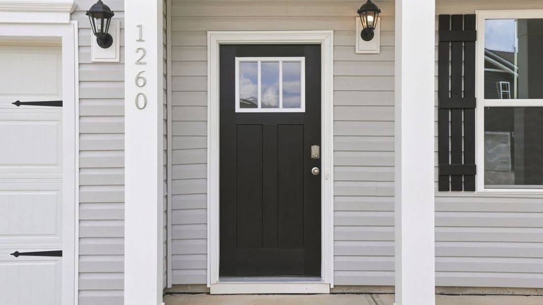 Exterior details and patio area of a home in Hunters Ridge, Woodruff (Image 3).