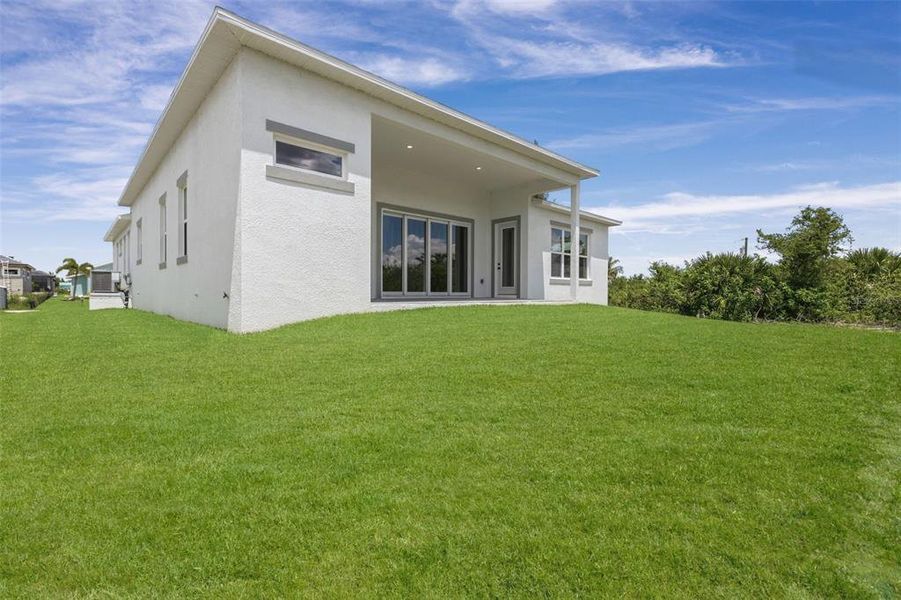 Exterior details and patio area of a home in , Port Charlotte (Image 37).