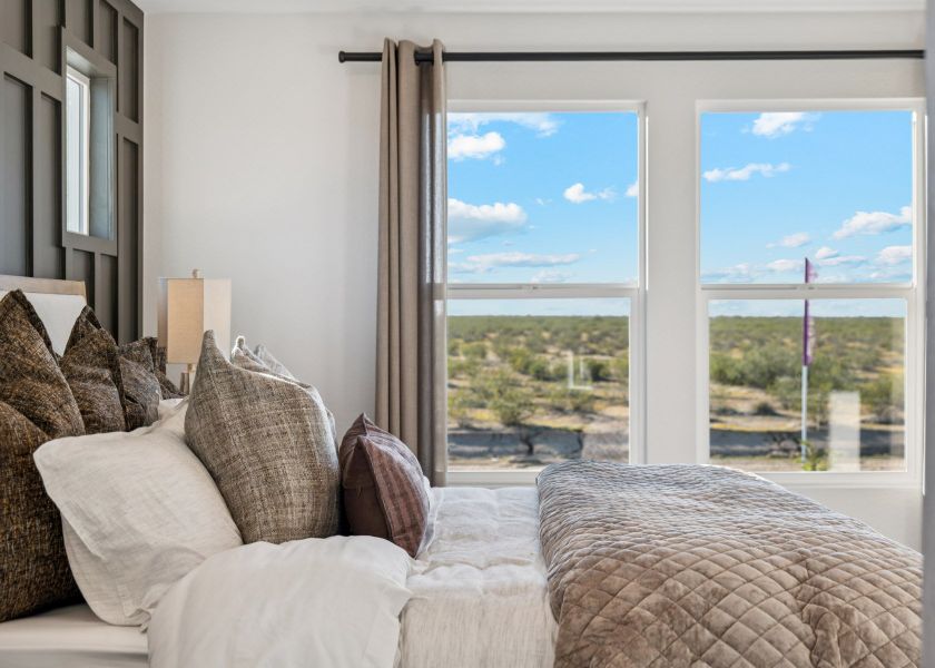 A couch and a window.