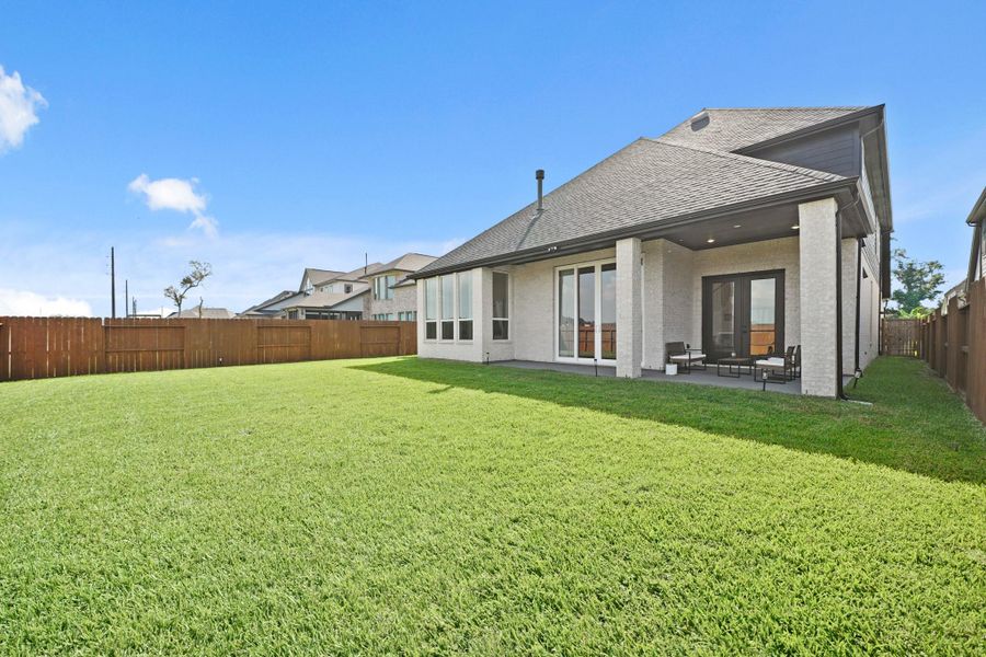 Exterior details and patio area of a home in Sienna, Missouri City (Image 24). Exterior details and patio area of a home in Sienna, Missouri City (Image 24).