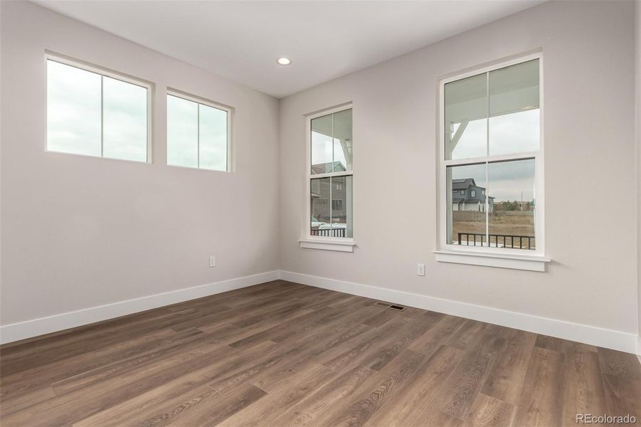Spacious, unfurnished interior of a new home in West Grange, Longmont (Image 31).