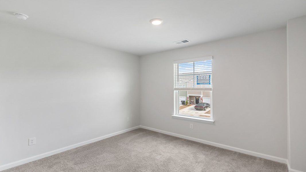 Spacious, unfurnished interior of a new home in Carolina Groves Townhomes, Moncks Corner (Image 16).