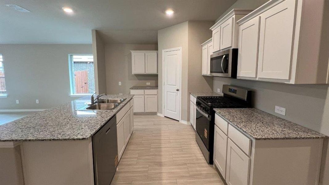 Furnished interior view inside a new home in Rosewood at Beltmill, Fort Worth (Image 4).