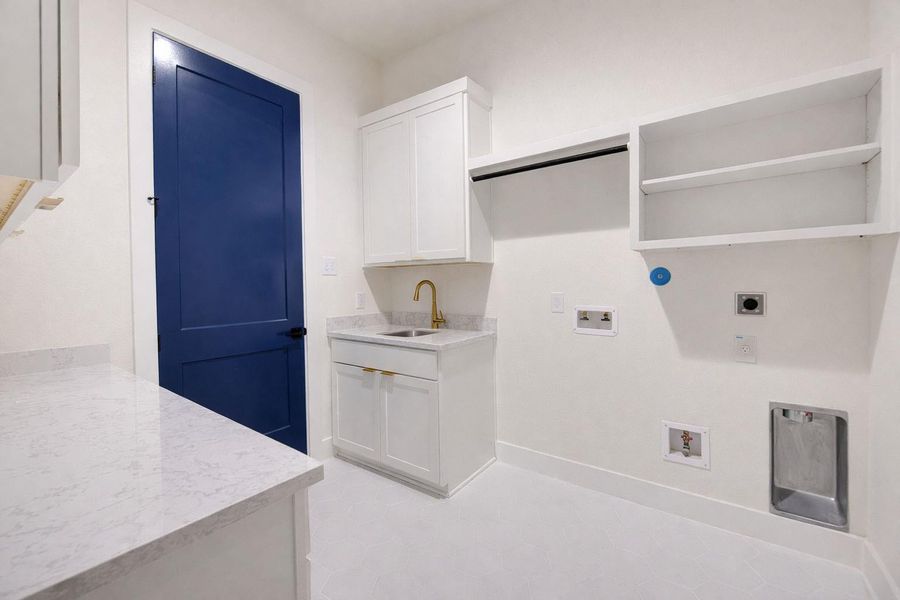 Well thought out laundry room is connected to the primary closet Well thought out laundry room is connected to the primary closet