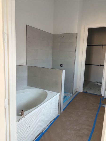 Primary Bath retreat with dual vanities, garden tub & walk-in shower