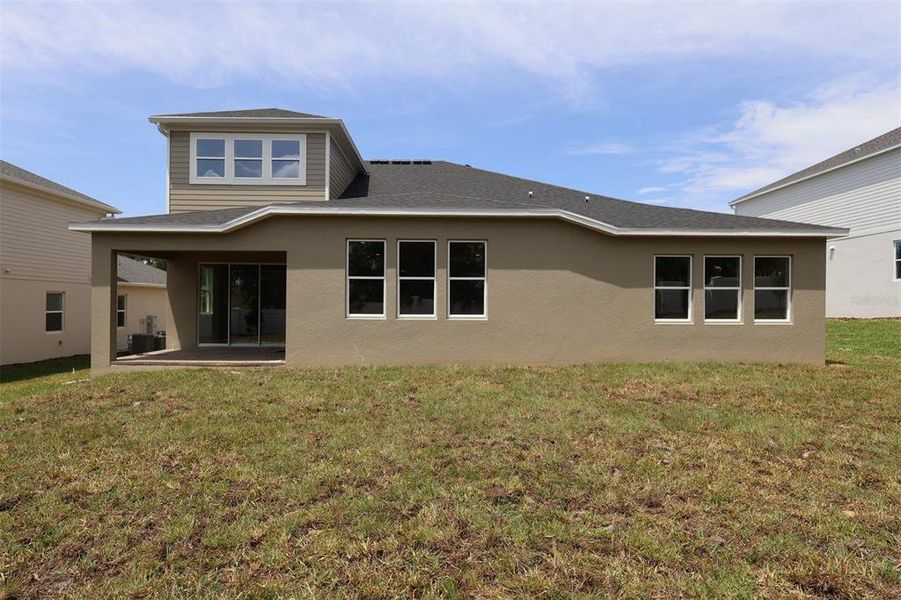 Exterior details and patio area of a home in Wolf Lake Ranch, Apopka (Image 4).