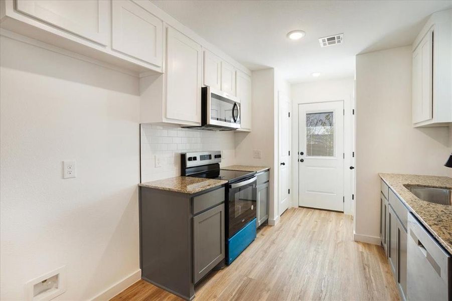 Furnished interior view inside a new home in Miller Street Cottages, Denison (Image 5).