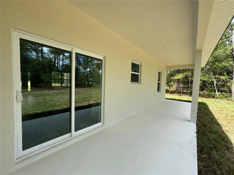 Exterior details and patio area of a home in , Citrus Springs (Image 4).