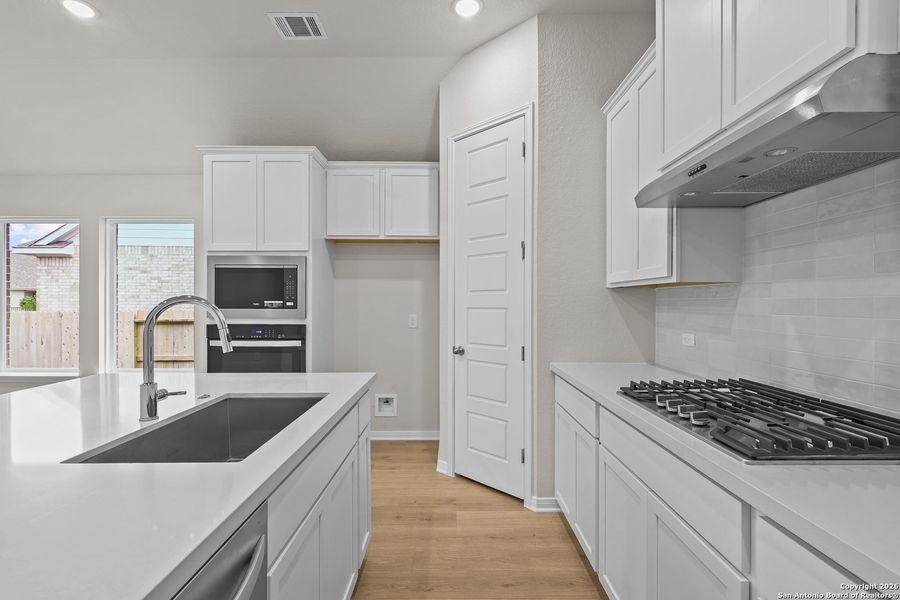 Furnished interior view inside a new home in Veramendi, New Braunfels (Image 9).