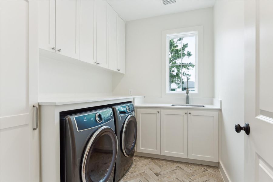 UTILITY ROOM - Previous work by the builder, not representation of current build.