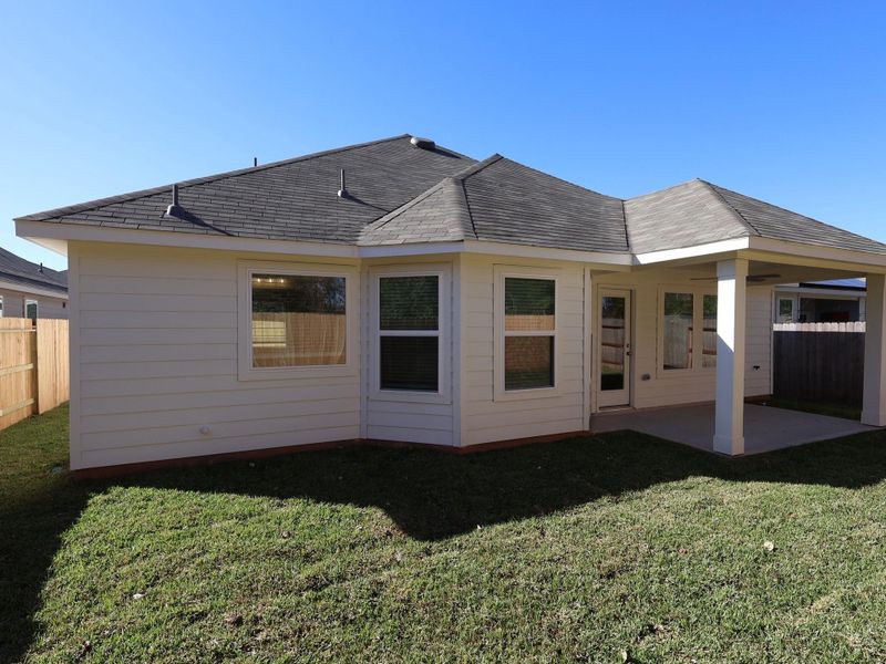 Exterior details and patio area of a home in Moran Ranch, Willis (Image 22).