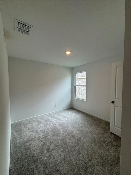 Spacious, unfurnished interior of a new home in Binford Creek, Waller (Image 29).