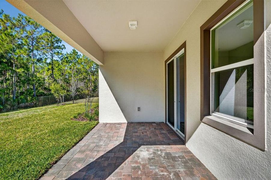 Exterior details and patio area of a home in Gray Hawk at Hole Two, Daytona Beach (Image 29).