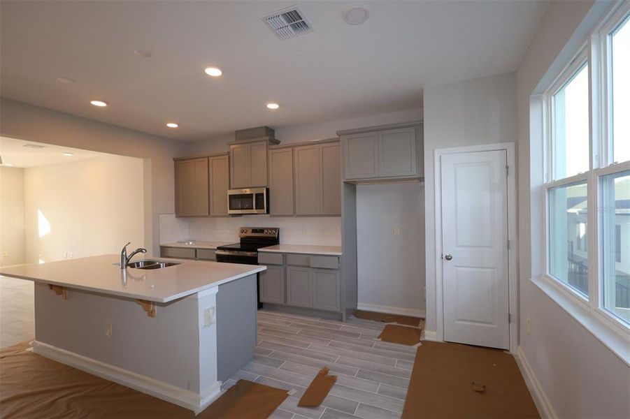 Furnished interior view inside a new home in Tribute at Ovation, Winter Garden (Image 10). Furnished interior view inside a new home in Tribute at Ovation, Winter Garden (Image 10).