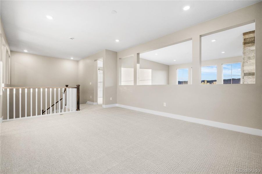 Spacious, unfurnished interior of a new home in Stargaze at Solstice, Littleton (Image 34).