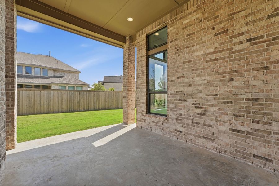 Exterior details and patio area of a home in Bridgeland 50′, Cypress (Image 19).