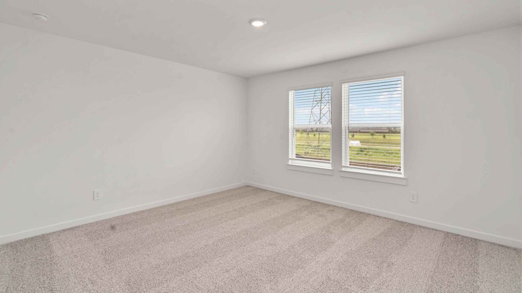 Representative unfurnished interior of a home built from the Hibiscus by D.R. Horton in City Gate North, Houston (Image 10).
