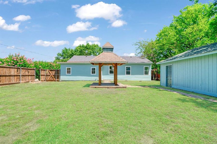 Back of property with a gazebo Back of property with a gazebo