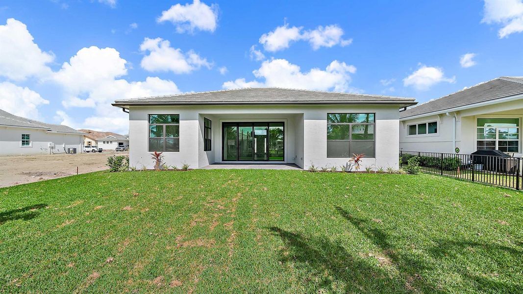 Front exterior of a new home in , Palm Beach Gardens, FL, highlighting curb appeal (Image 21).
