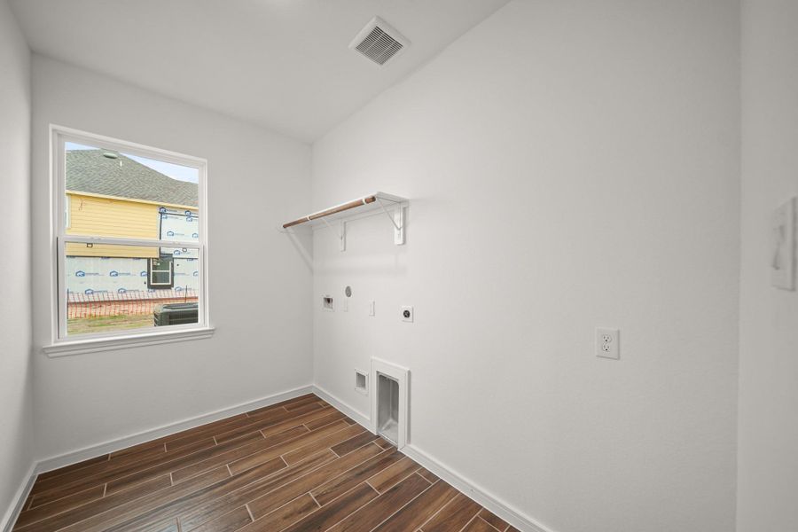 Laundry room (*Photo not of actual home and used for illustration purposes only.)