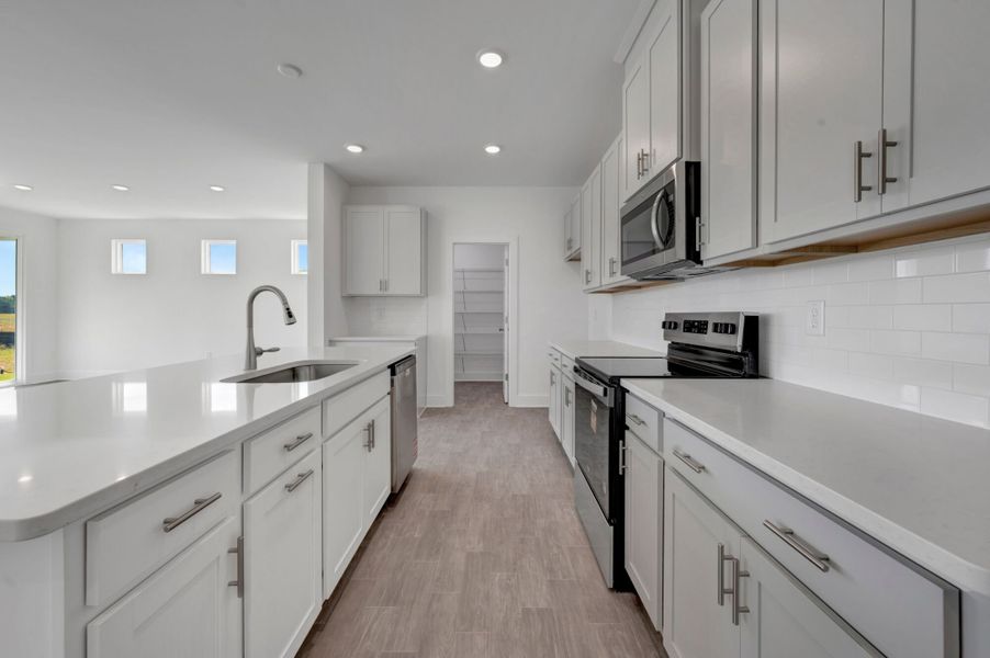 Furnished interior view inside a new home in McAlister Creek, Clayton (Image 6).