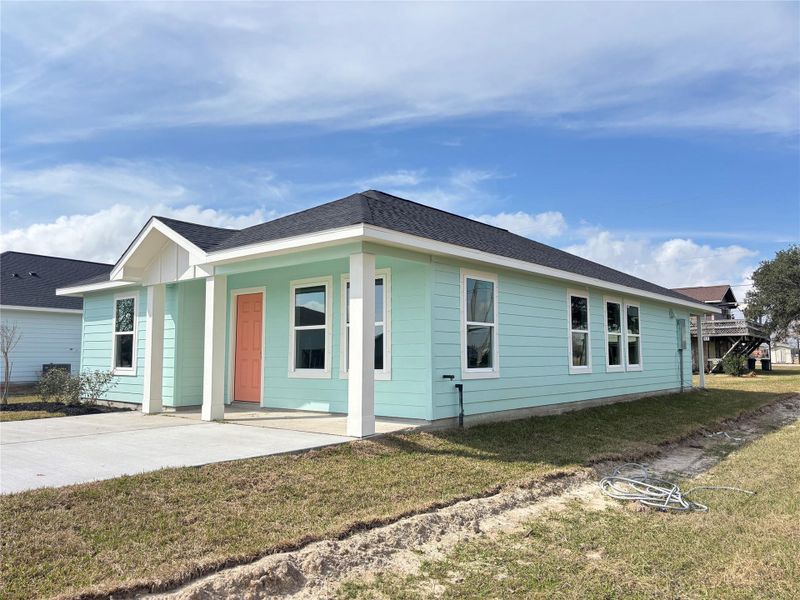 Front exterior of a new home in , Palacios, TX, highlighting curb appeal (Image 24).