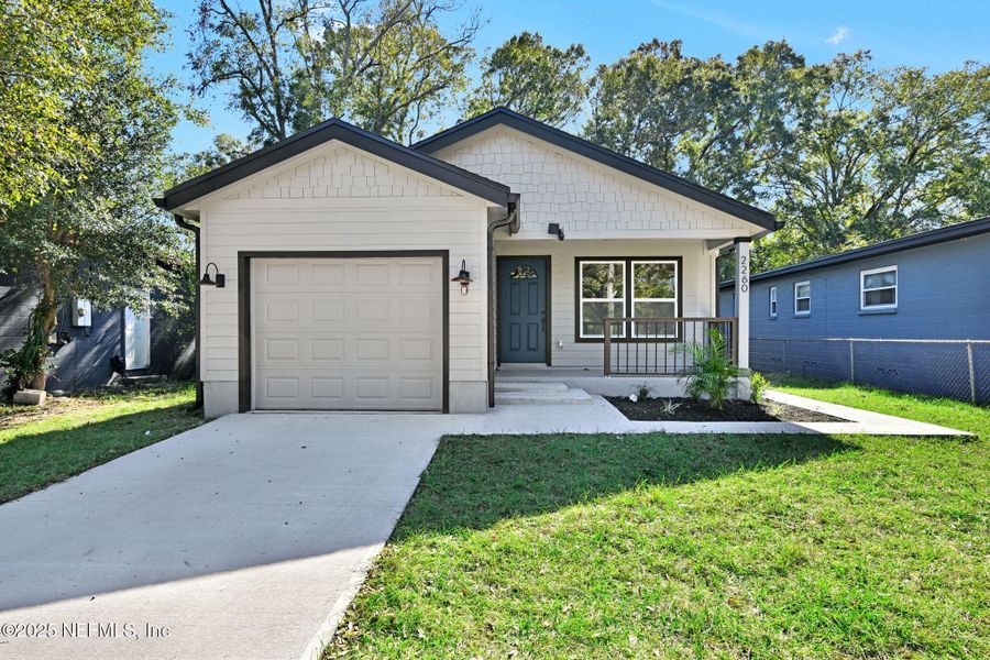 Front exterior of a new home in , Jacksonville, FL, highlighting curb appeal (Image 21). Front exterior of a new home in , Jacksonville, FL, highlighting curb appeal (Image 21).