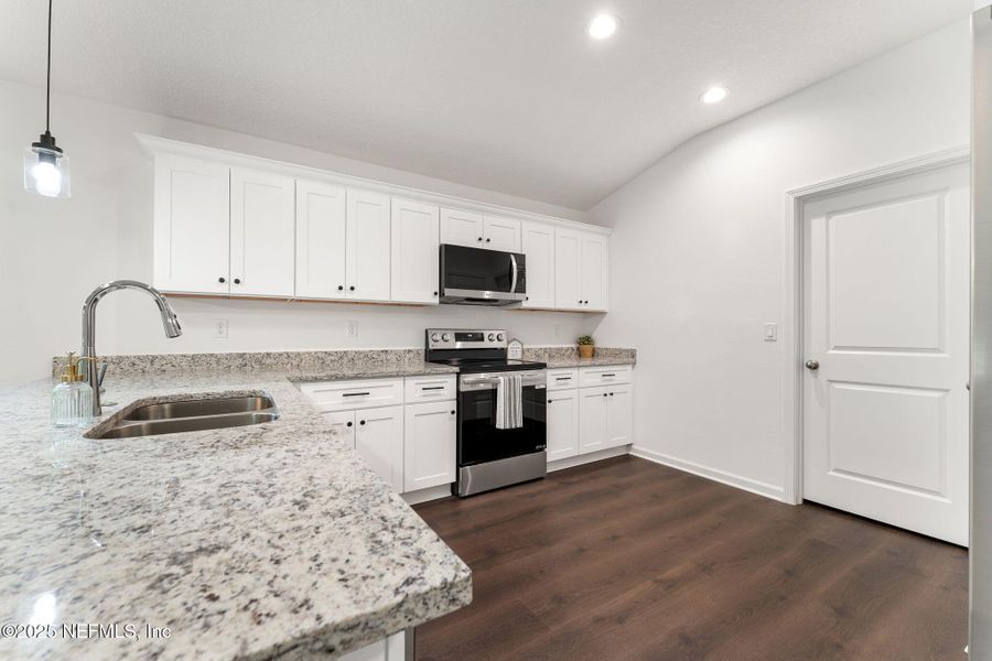 Furnished interior view inside a new home in , Green Cove Springs (Image 7).