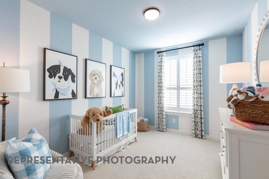 Bedroom featuring carpet flooring and baseboards Bedroom featuring carpet flooring and baseboards