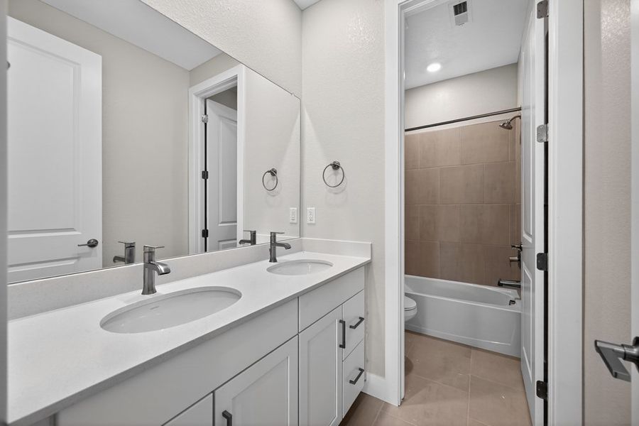 Furnished interior view inside a new home in Trailstone, Arvada (Image 16).