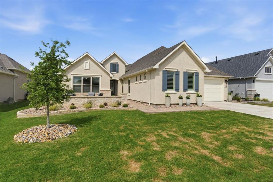 Front exterior of a new home in , Denton, TX, highlighting curb appeal (Image 21).