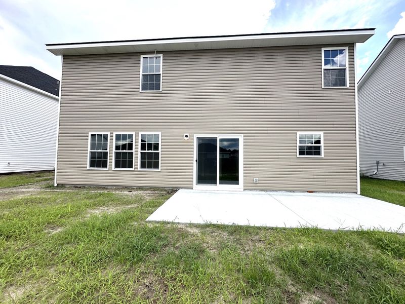 Exterior details and patio area of a home in Tranquil South, Hinesville (Image 2).