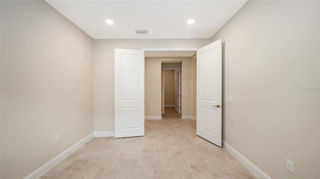 Spacious, unfurnished interior of a new home in Grand Park, Sarasota (Image 38).