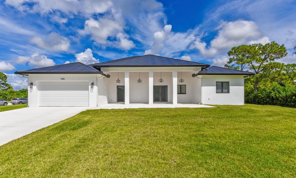 Exterior details and patio area of a home in , West Palm Beach (Image 22).
