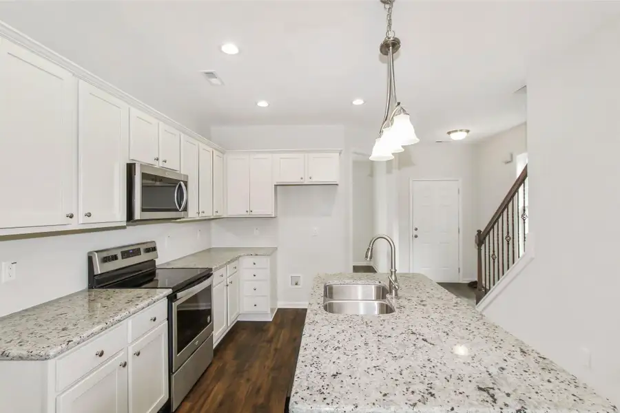 Representative furnished interior of a home built from the Furyk by RiverWILD Homes in Riverwood Ranch, Clayton (Image 7).